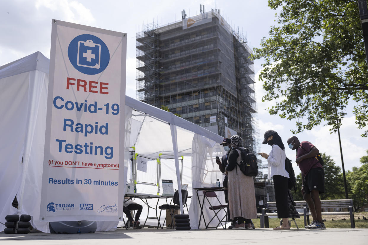 LONDON, ENGLAND - JUNE 15: A Covid-19 rapid testing facility is set up in Elephant and Castle on June 15, 2021 in London, England. Around 30 million people, or 45 percent, in the UK are fully vaccinated against Covid-19, but the government has postponed the full easing of social restrictions for another month, to allow time to expand its vaccination programme even further. (Photo by Dan Kitwood/Getty Images)