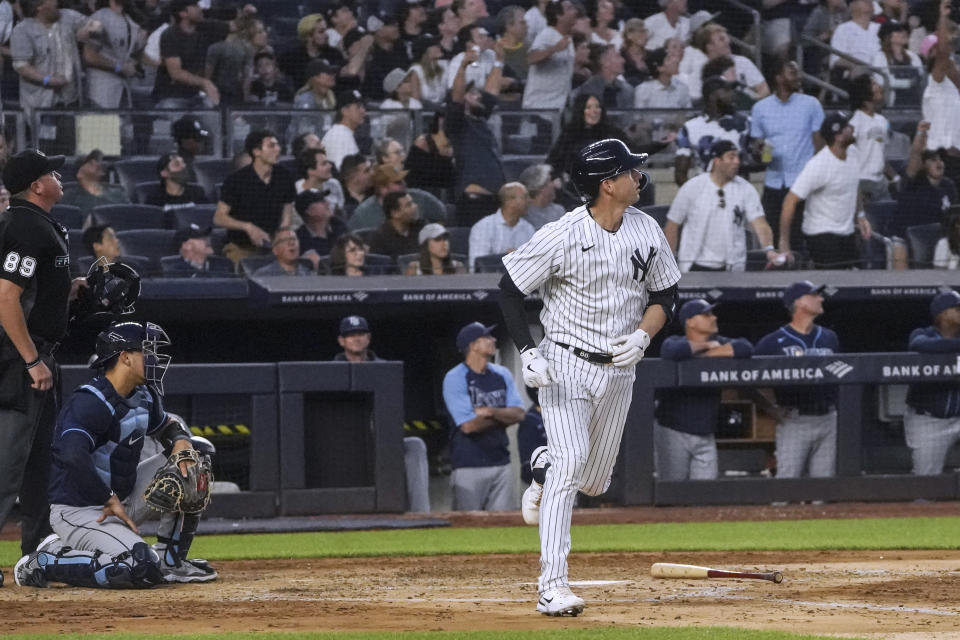 New York Yankees' Kyle Higashioka watches his three-run homer in the fifth inning of the team's baseball game against the Tampa Bay Rays, Wednesday, June 15, 2022, in New York. (AP Photo/Bebeto Matthews)