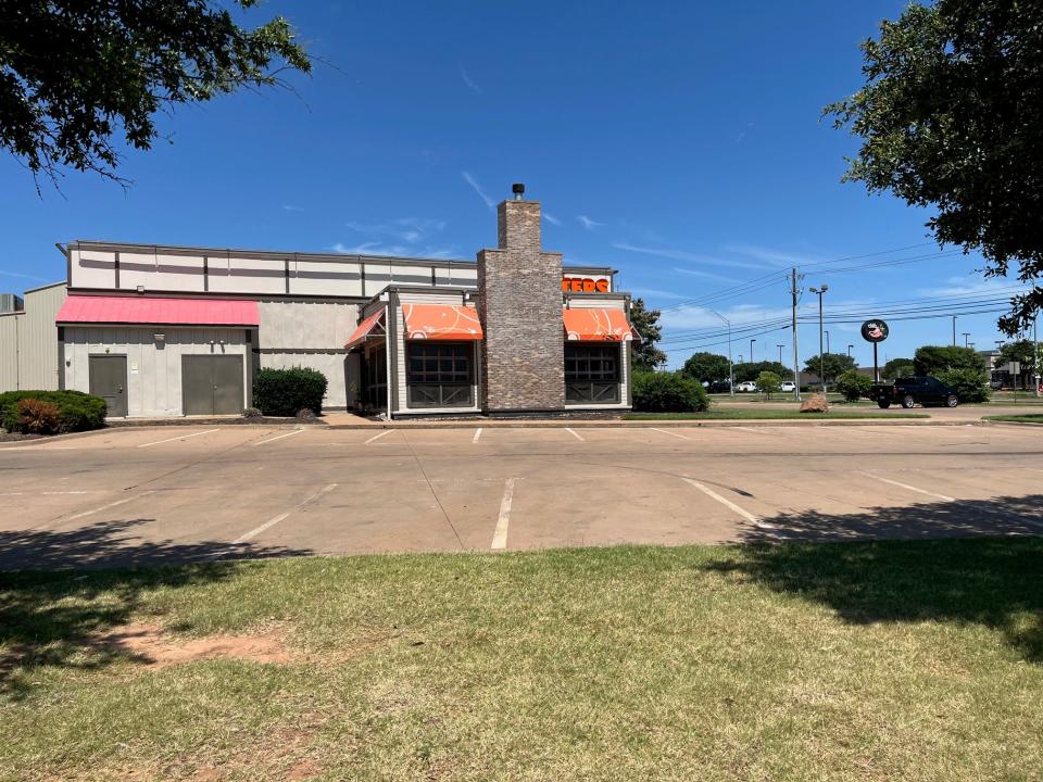 The parking lot at the Hooter's restaurant on Call Field Road was empty Sunday, June 23, 2024, after the store abruptly closed.