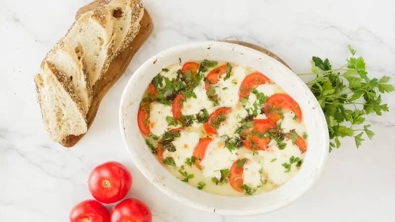 Baguette with mozzarella, tomato, and herb baked dish