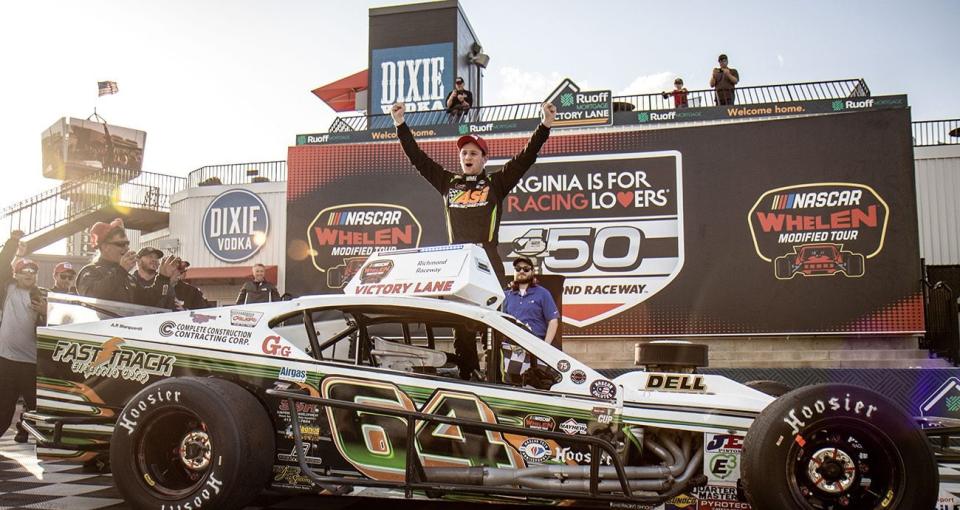 Austin Beers, driver of the #64 Hughes Motors, AP Marquadt & Sons, Dell Electric, Lumiere Electrical, Andrew James Interiors Modified, celebrates in victory lane after winning the Virginia Is For Racing Lovers 150 for the NASCAR Whelen Modified Tour at Richmond Raceway in Richmond, Virginia on March 31, 2023. (Rob Branning/NASCAR)