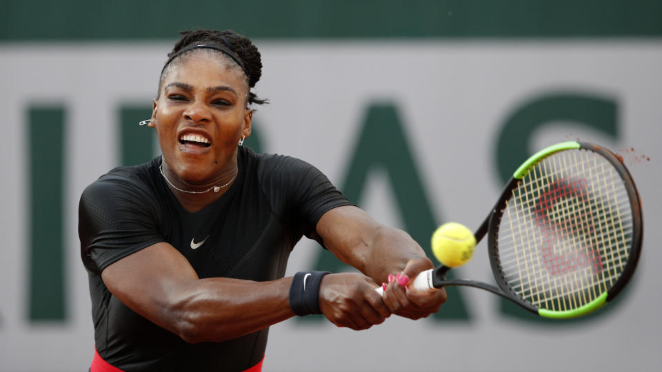 FILE - In this June 2, 2018, file photo, Serena Williams of the United States, returns a shot against Germany's Julia Georges during their third round match at the French Open tennis tournament at the Roland Garros stadium in Paris, France. (AP Photo/Christophe Ena, File)