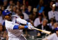 Cubs' Castro hits a single against the Cardinals during the seventh inning of their National League MLB baseball game in Chicago