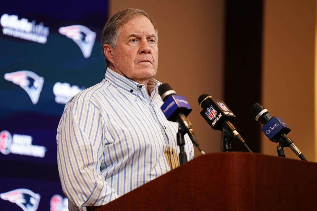 Patriots head coach Bill Belichick talks with reporters after Sunday's game against the New York Jets at Gillette Stadium.