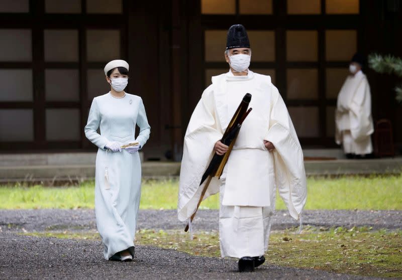 FILE PHOTO: Japan's Princess Mako walks towards the Three Palace Sanctuaries to pray ahead of her marriage at the Imperial Palace in Tokyo