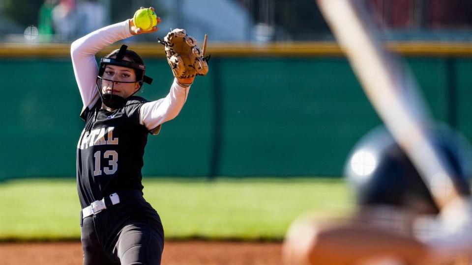 Capital senior Penny-Lew Barnett pitches to an Owyhee batter in the 5A District Three softball semifinals, Wednesday at Eagle High.