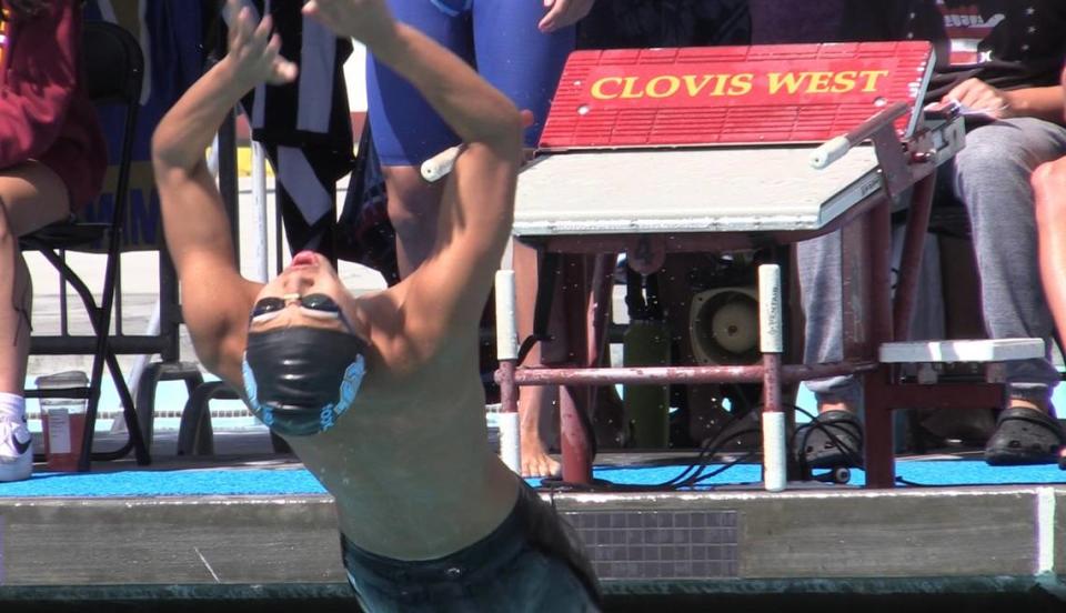 Nicola Saito starts off for Clovis North in the 200 medley relay in the Central Section Division I championships at the Clovis West Aquatics Center on Saturday, May 6, 2023.