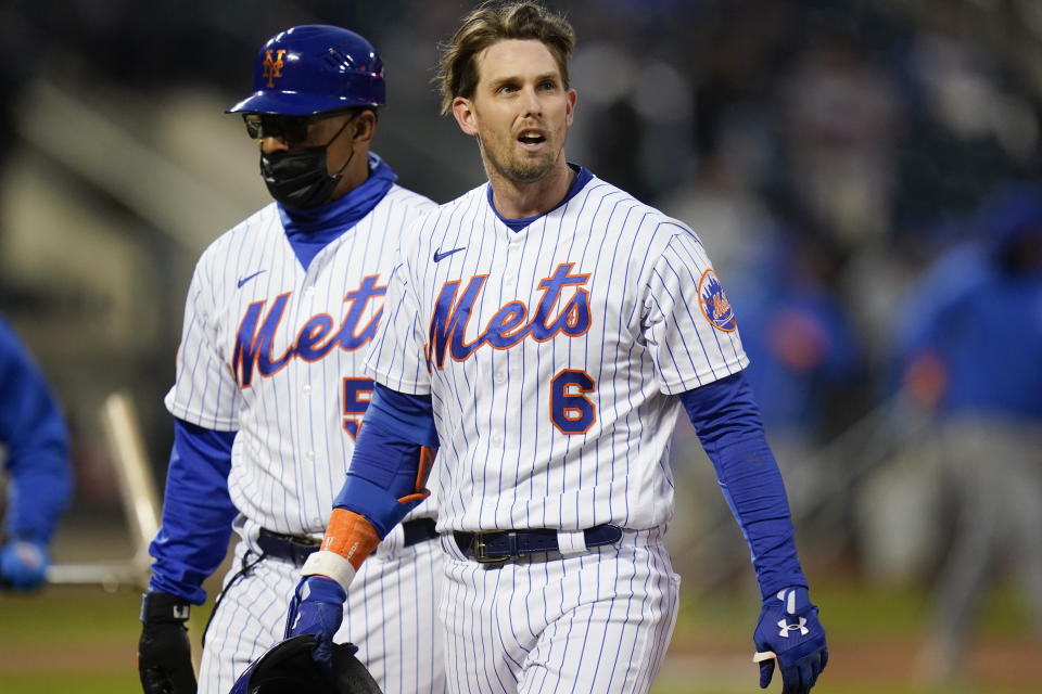 New York Mets' Jeff McNeil (6) leaves the field after being hurt during the third inning of the team's baseball game against the Baltimore Orioles on Tuesday, May 11, 2021, in New York. (AP Photo/Frank Franklin II)