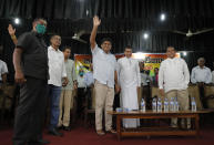 Sri Lanka's main opposition candidate Sajith Premadasa, center, waves to supporters during a meeting in Colombo, Sri Lanka, July 31, 2020. Sajith Premadasa is the son of former President Ranasinghe Premadasa who was killed in a suicide bombing by separatist rebels in 1993. Premadasa leads a political party that broke away from the United National Party, the country's largest party. (AP Photo/Eranga Jayawardena)