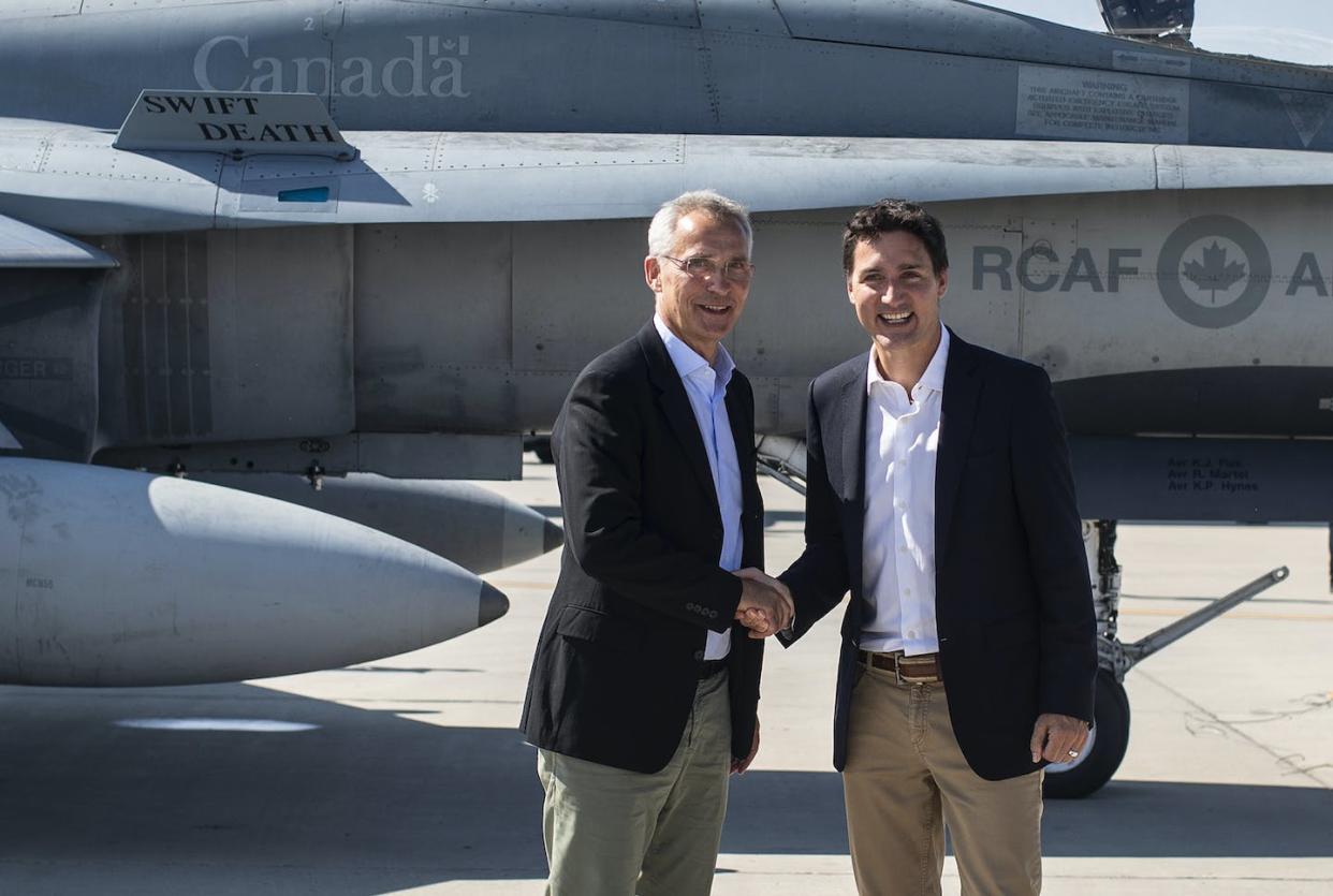 NATO Secretary General Jens Stoltenberg and Prime Minister Justin Trudeau say goodbye at 4 Wing Cold Lake air base in Cold Lake Alta, in August 2022 after a Stoltenberg visit. THE CANADIAN PRESS/Jason Franson