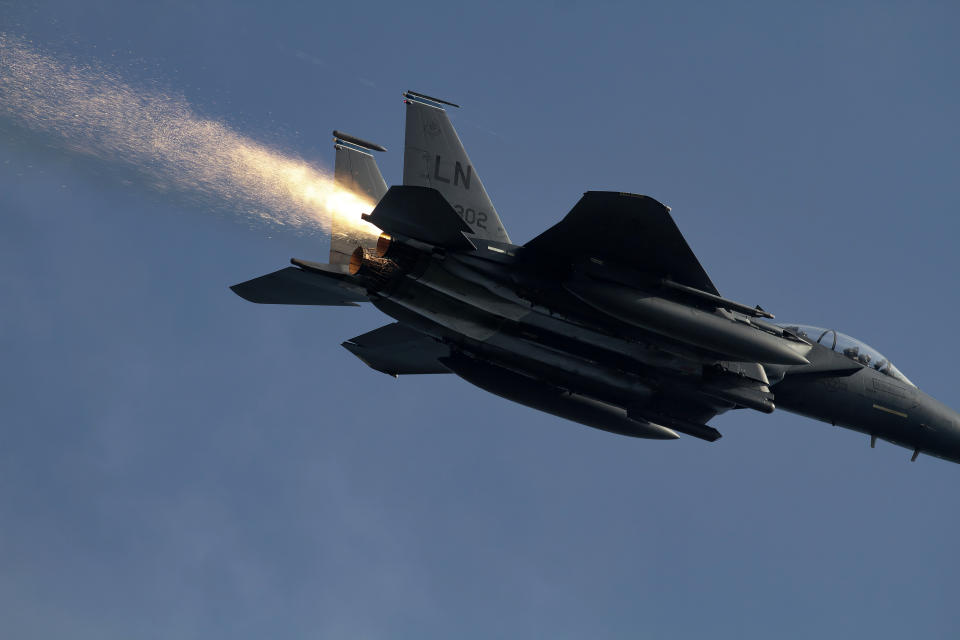 This photo made available by Ian Simpson on Friday July 23, 2021, shows a shower of sparks from an F-15E Strike Eagle that experienced a malfunction after takeoff, near RAF Lakenheath, Lakenheath, England, on July 13, 2021. Photographer Ian Simpson was honored by the 48th Fighter Wing for alerting Lakenheath about the troubles when he realized the pilot wasn’t aware of the issue. (Ian Simpson via AP)