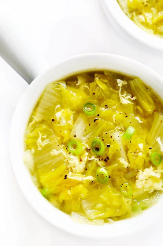 <p>Gimme Some Oven</p><p> Simple to make in just 20 minutes, and full of the best healthy ingredients and comforting flavors.</p><p><strong>Get the recipe:</strong> <a href="https://www.gimmesomeoven.com/cabbage-egg-drop-soup/" rel="nofollow noopener" target="_blank" data-ylk="slk:Cabbage Egg Drop Soup;elm:context_link;itc:0;sec:content-canvas" class="link ">Cabbage Egg Drop Soup</a></p>