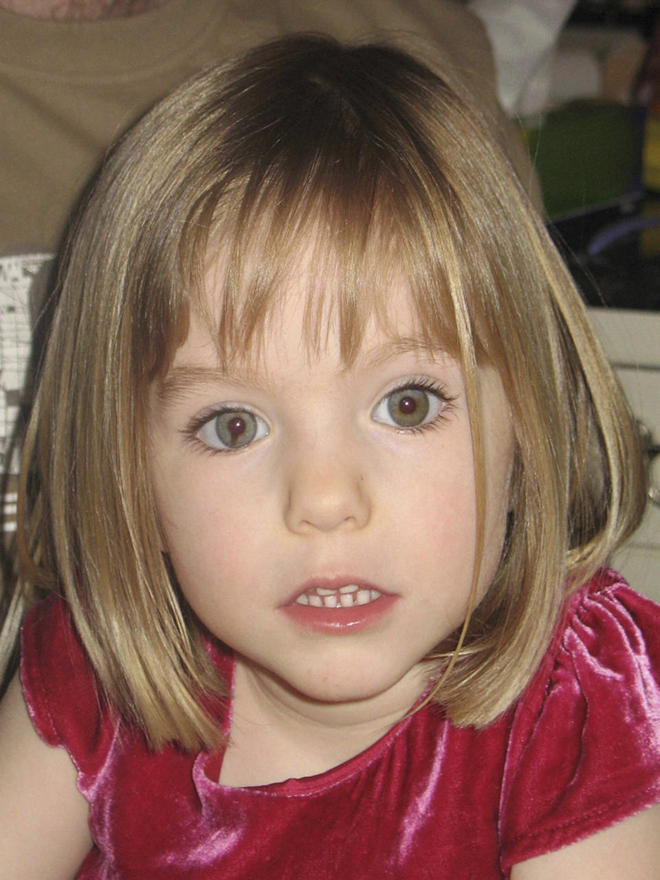 FILE - This undated family photo shows Madeleine McCann. The parents of Madeleine McCann, a British toddler who vanished from an apartment during her family’s vacation in Portugal 15 years ago and captured global interest, say they remain hopeful that efforts by police in three countries to solve the mystery will eventually bring answers. Kate and Gerry McCann, both British doctors living in England, said in a statement to mark the anniversary of their daughter’s disappearance Tuesday, May 3, 2022 that “a truly horrific crime” was committed in 2007. (Family Photo via AP, File)