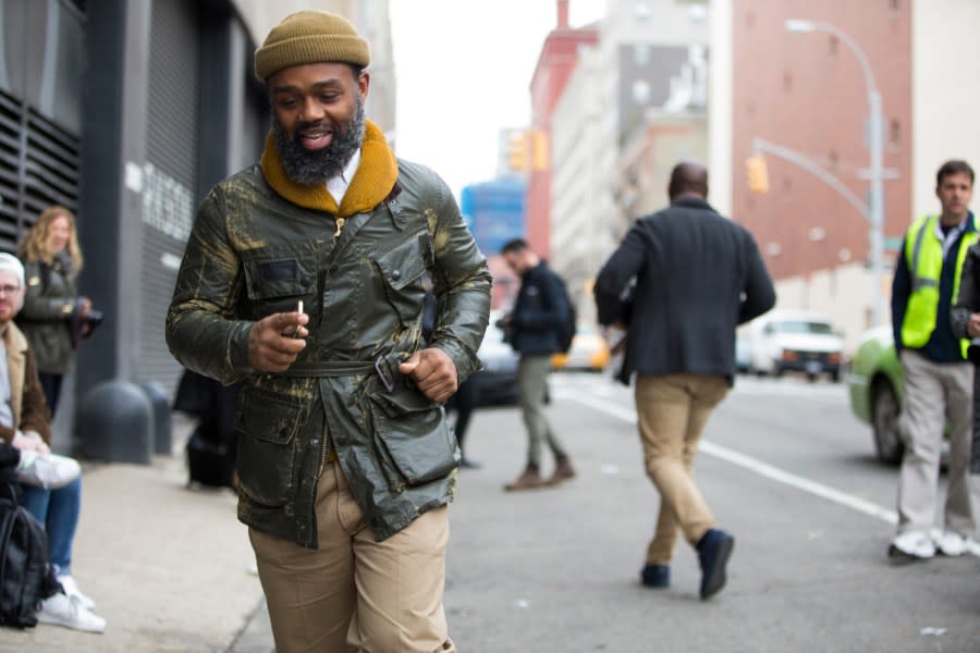 Ouigi Theodore of The Brooklyn Circus runs into a show during New York Fashion Week: Men’s Fall/Winter 2016 on February 04, 2016, in New York City.