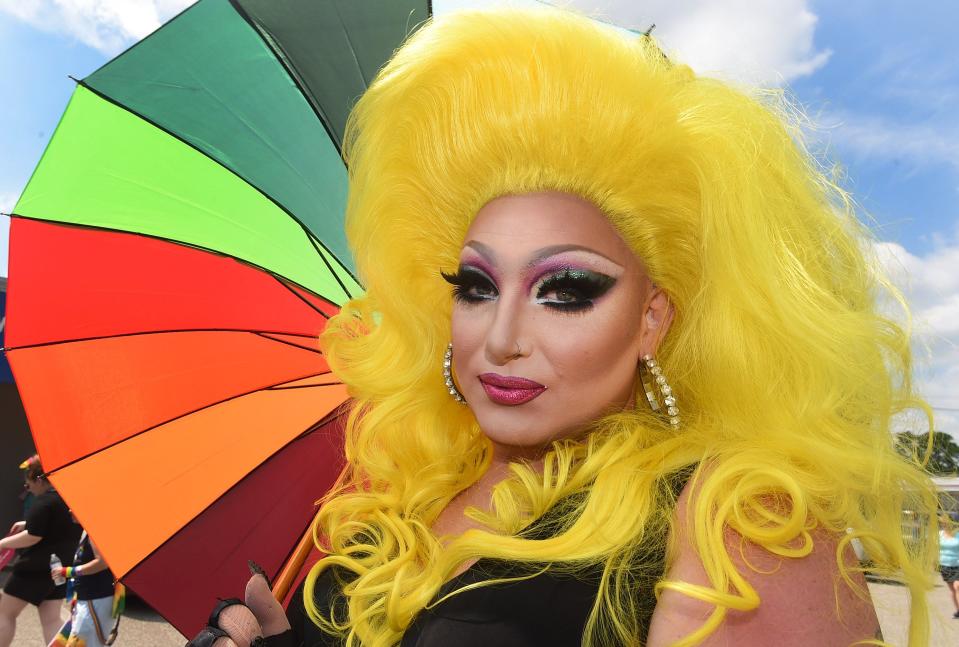 Drag performer Rebecca Mae of Erie rides in the Erie Pride parade on June 30 in Erie. The parade concluded at Perry Square with Pridefest, that featured live music and vendors.