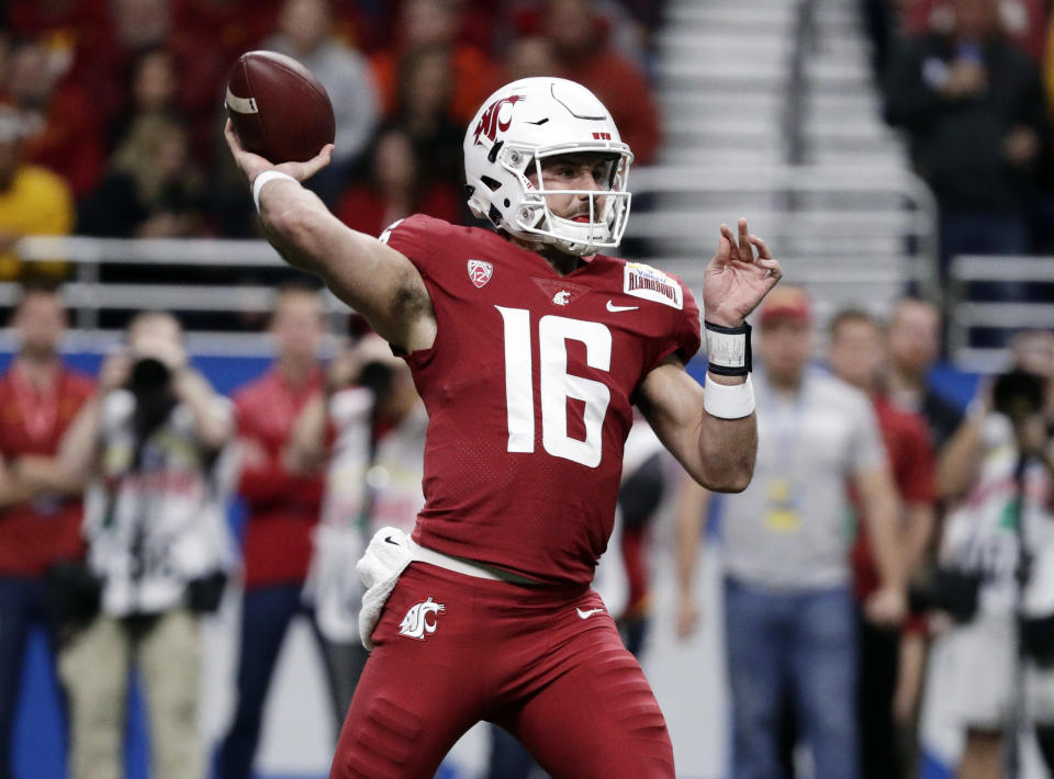 Washington State quarterback Gardner Minshew (16) throws a pass against Iowa State during the the first half of the Alamo Bowl NCAA college football game Friday, Dec. 28, 2018, in San Antonio. (AP Photo/Eric Gay)