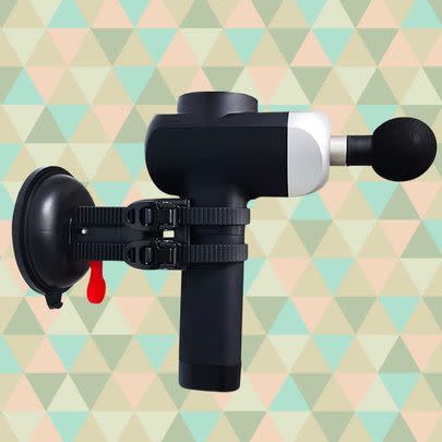 An adjustable massage gun wall mount