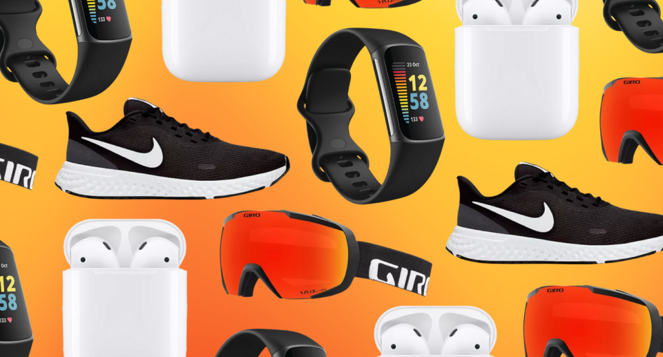 sport chek air pods, fit bit, ski goggles, nike sneakers, orange background