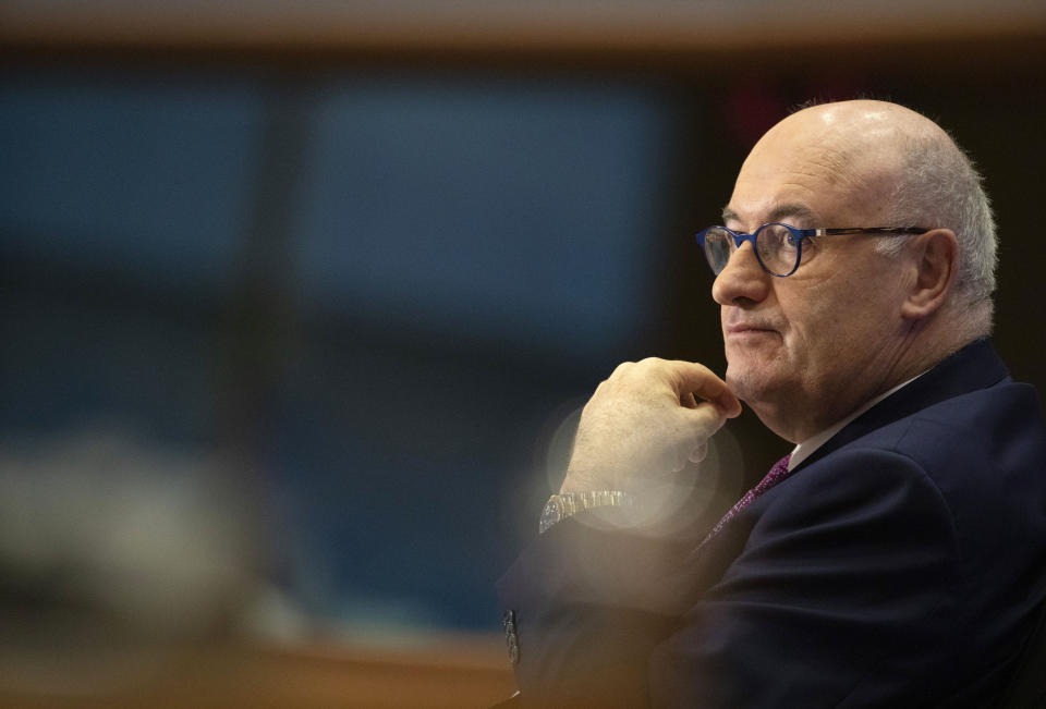 European Commissioner designate for Trade Phil Hogan answers questions during his hearing at the European Parliament in Brussels, Monday, Sept. 30, 2019. (AP Photo/Virginia Mayo)