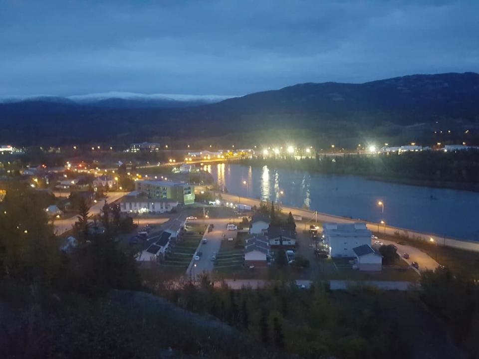 A view of downtown Whitehorse and the Yukon River, September 2021. The Yukon government is implementing stronger public health measures to prevent its health care system from being overwhelmed. (Paul Tukker/CBC - image credit)