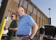 Homeland Security Secretary Alejandro Mayorkas tours a section of the border wall with Mexico, Tuesday, May 17, 2022, in Hidalgo, Texas. (Joel Martinez/The Monitor via AP, Pool)