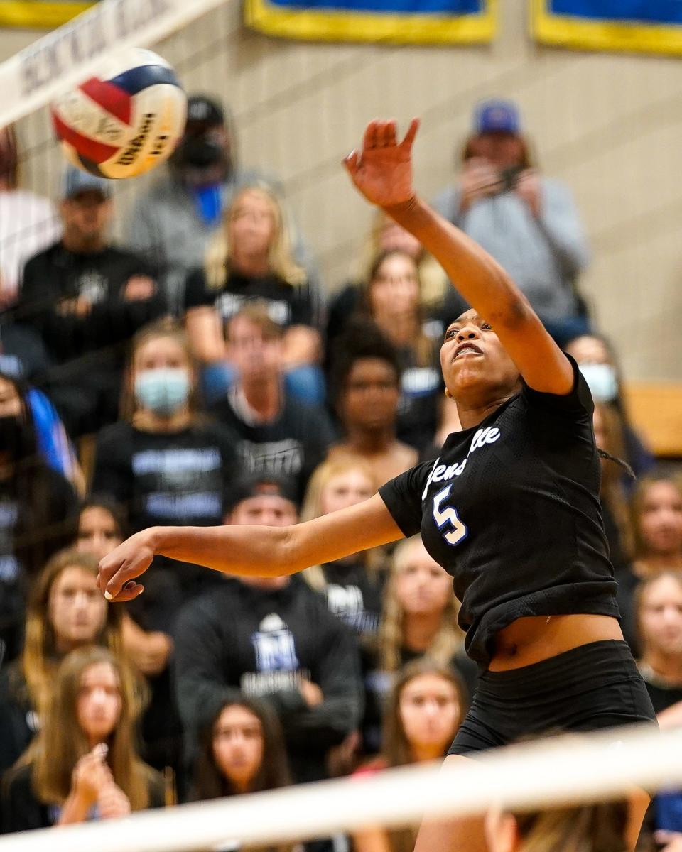 Nolensville's Kaira Knox (5) spikes the ball against Brentwood during a District 11-AAA semifinal game at Brentwood High School in Brentwood, Tenn., Wednesday, Oct. 6, 2021.