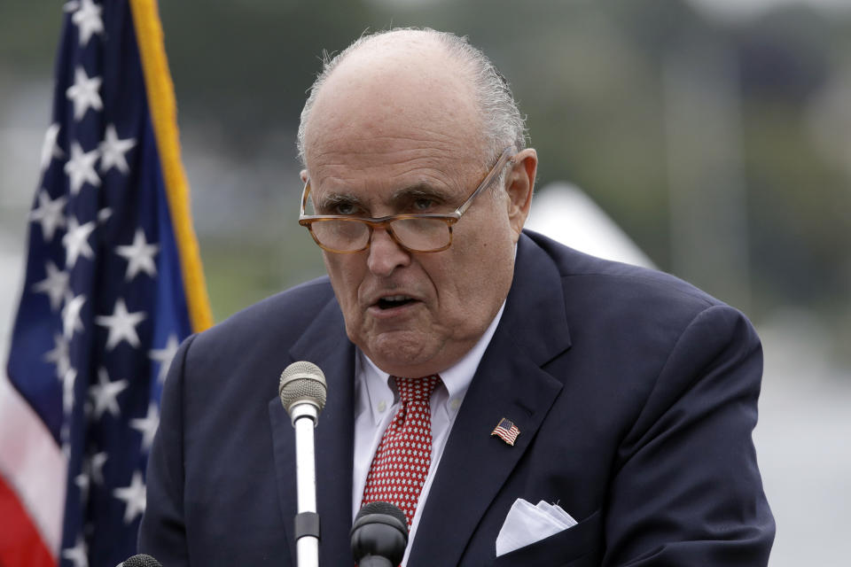 FILE - In this Aug. 1, 2018, file photo,Rudy Giuliani, personal attorney for President Donald Trump, speaks in Portsmouth, N.H. Giuliani, says he’s being represented by three lawyers as federal prosecutors in New York look into his business dealings. (AP Photo/Charles Krupa, File)