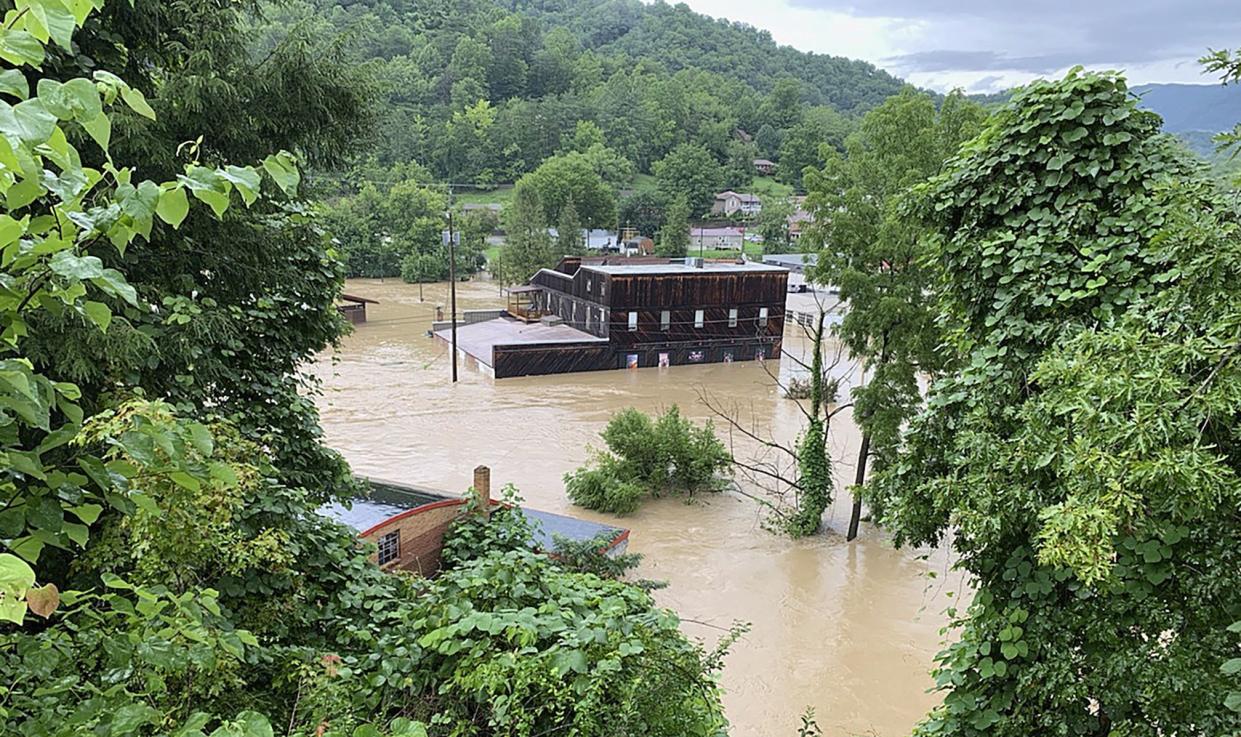 This July 28, 2022, photo provided by Appalshop, shows the flooded Appalshop building in Whitesburg, Ky. The cultural center known for chronicling Appalachian life is cleaning up and assessing its losses. Like much of its stricken region, Appalshop has been swamped by historic flooding. The water inundated downtown Whitesburg in southeastern Kentucky, causing extensive damage to the renowned repository of Appalachian history and culture.