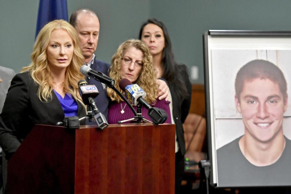 Centre County District Attorney Stacy Parks Miller announces the findings of an investigation into the death of Timothy Piazza, flanked by his parents Evelyn and Jim (Abby Drey /Centre Daily Times via AP)