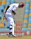 West Indies cricket team captain Darren Sammy is clean bowled off Australian bowler Shane Watson during the final day of the first-of-three Test matches between Australia and West Indies at the Kensington Oval stadium in Bridgetown on April 11, 2012. AFP PHOTO/Jewel Samad (Photo credit should read JEWEL SAMAD/AFP/Getty Images)