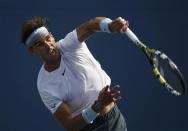 Rafael Nadal of Spain serves to Ivan Dodig of Croatia at the U.S. Open tennis championships in New York August 31, 2013. REUTERS/Ray Stubblebine