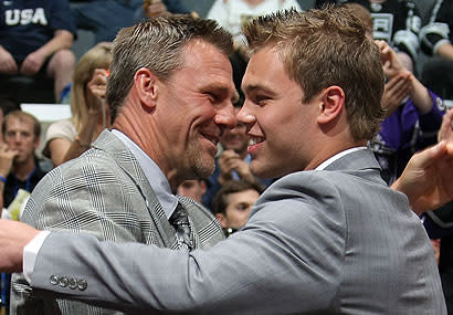 Taylor Hall, right, hugs his father, Steve, after being taken first-overall at the 2010 NHL Entry Draft