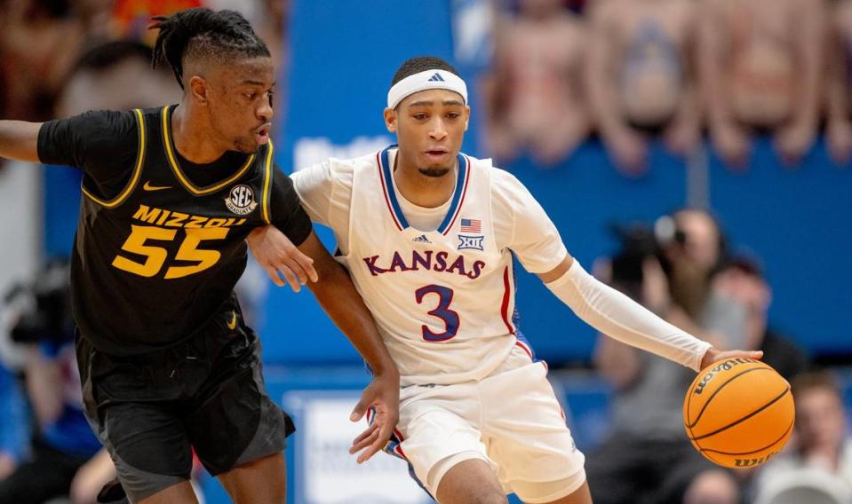 Missouri’s Sean East (55) pressured Kansas’ Dajuan Harris Jr. (3) during the Jayhawks’ 73-64 win over the Tigers in Lawrence. A Louisville native, East is averaging 17.1 points, 2.8 rebounds, 3.5 assists this season.