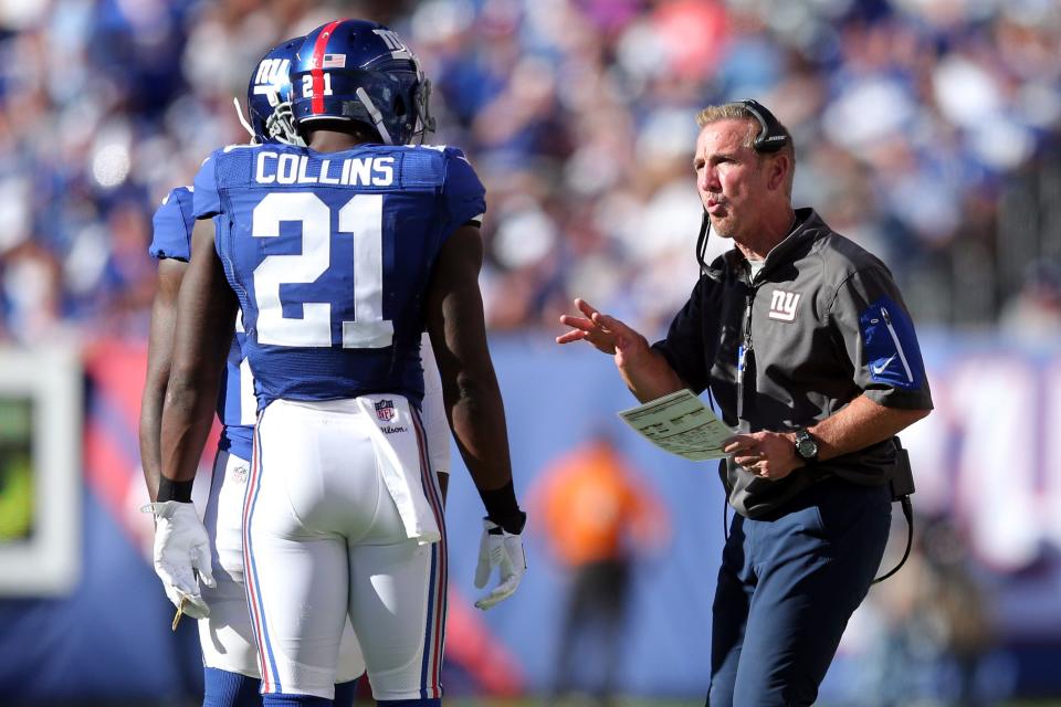Sep 25, 2016; East Rutherford, NJ, USA; New York Giants defensive coordinator Steve Spagnuolo talks with New York Giants safety Landon Collins (21) during the fourth quarter against Washington at MetLife Stadium. Mandatory Credit: Brad Penner-USA TODAY Sports