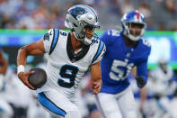 Carolina Panthers quarterback Bryce Young runs with the ball during the first half of an NFL preseason football game against the New York Giants, Friday, Aug. 18, 2023, in East Rutherford, N.J. (AP Photo/John Munson)