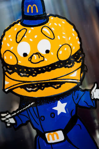 <p><strong>The Rundown: </strong>The official peacekeeper of McDonaldland, Officer Big Mac is Mayor McCheese's right hand man, chief advisor, and the main elected official of this burger 'burb. </p><p><strong> M.O.: </strong>Officer Mac's main concern is keeping everyone in line in McDonaldland. Catch him directing traffic at the roundabout. </p><p><strong>Kryptonite: </strong>Hamburglar and Captain Crook, AKA the Hook-esque version of Hamburglar, whose main goal in life is stealing Filet-O-Fish sandwiches</p><p><strong>Superpower:</strong> With the body of a man and the head of a burger, Officer Big Mac really is the best of both worlds. </p>