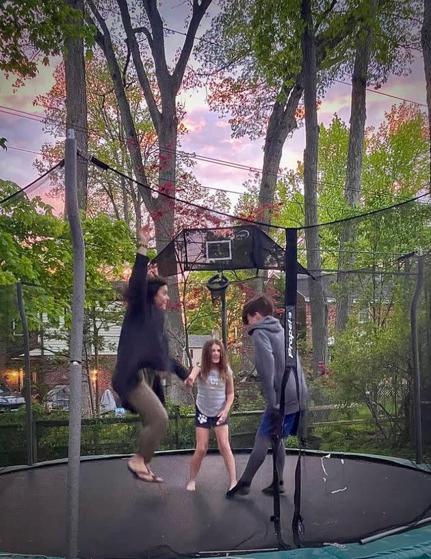 The author with her children jumping on a trampoline on her 40th birthday. 