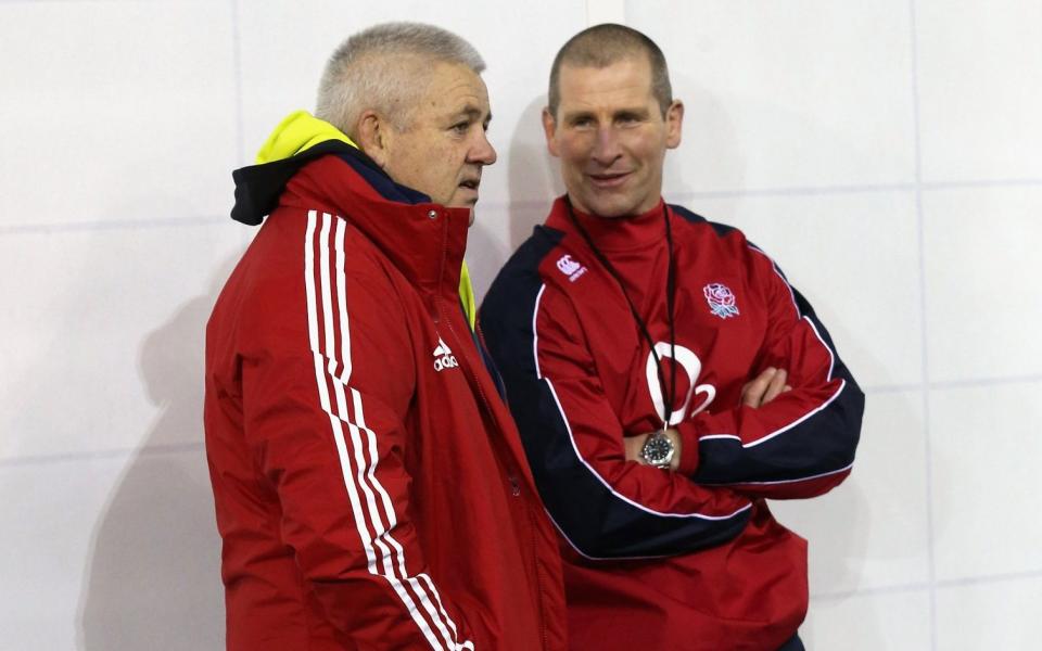 Warren Gatland (L) the British and Irish Lions head coach talks to England head coach Stuart Lancaster during the England training session held at St Georges Park on February 13, 2013 - GETTY IMAGES