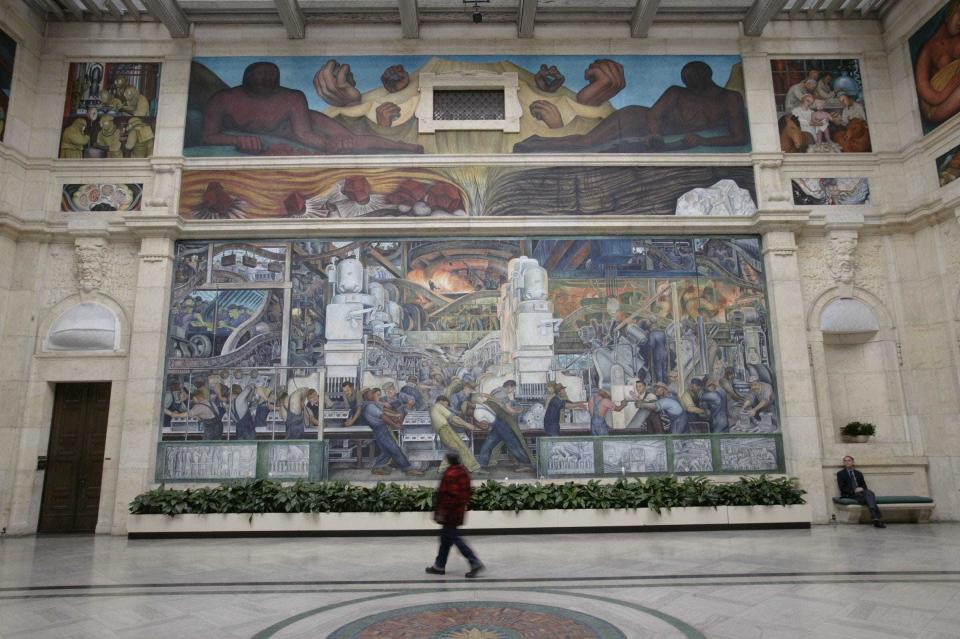 Diego Rivera began painting the series of massive frescoes which would make up the Detroit Industry Murals in 1932. The Mexican artist, accompanied by wife Frida Kahlo, spent nearly a year at the Detroit Institute of Arts working on the courtyard murals that would become the museum's centerpiece.