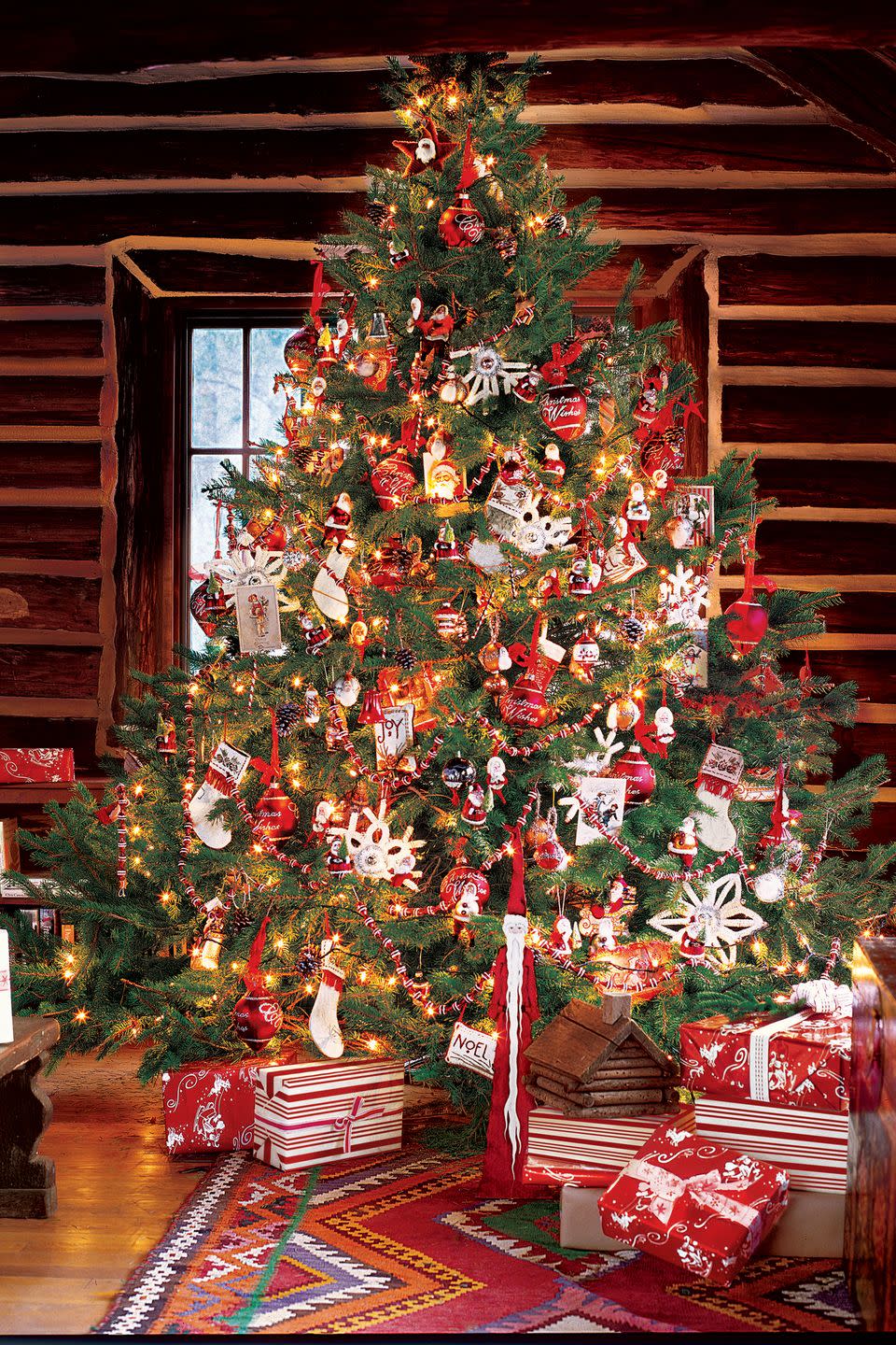 <p class="imageContent">No need to go out-of-the-ordinary for something extraordinary. Use your staple holiday ornaments like Santa, snowflakes, and stockings to create a superfestive and fun tree. Choose ornaments in the same red-and-white palette to pull it all together.</p><p><a class="link " href="https://www.amazon.com/OWUYUXI-Christmas-Ornaments-Decorations-Stockings/dp/B08D7FNCNX/ref=sr_1_30_sspa?dchild=1&keywords=stocking+ornaments&qid=1603208053&s=home-garden&sr=1-30-spons&psc=1&spLa=ZW5jcnlwdGVkUXVhbGlmaWVyPUEzTElUTUZXTVUyNEswJmVuY3J5cHRlZElkPUExMDA2MTk4MzRHVDdRNzRLSTk1SSZlbmNyeXB0ZWRBZElkPUEwNTc3MTQxMllaQlVTRjhJSThSMyZ3aWRnZXROYW1lPXNwX2J0ZiZhY3Rpb249Y2xpY2tSZWRpcmVjdCZkb05vdExvZ0NsaWNrPXRydWU%3D&tag=syn-yahoo-20&ascsubtag=%5Bartid%7C10050.g.1251%5Bsrc%7Cyahoo-us" rel="nofollow noopener" target="_blank" data-ylk="slk:SHOP ORNAMENTS;elm:context_link;itc:0;sec:content-canvas">SHOP ORNAMENTS</a></p>