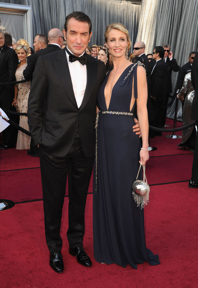 <b>Oscars 2012: Red carpet photos</b><br><br>Jean Dujardin, who won Best Actor for his role in 'The Artist' and Alexandra Lamy.