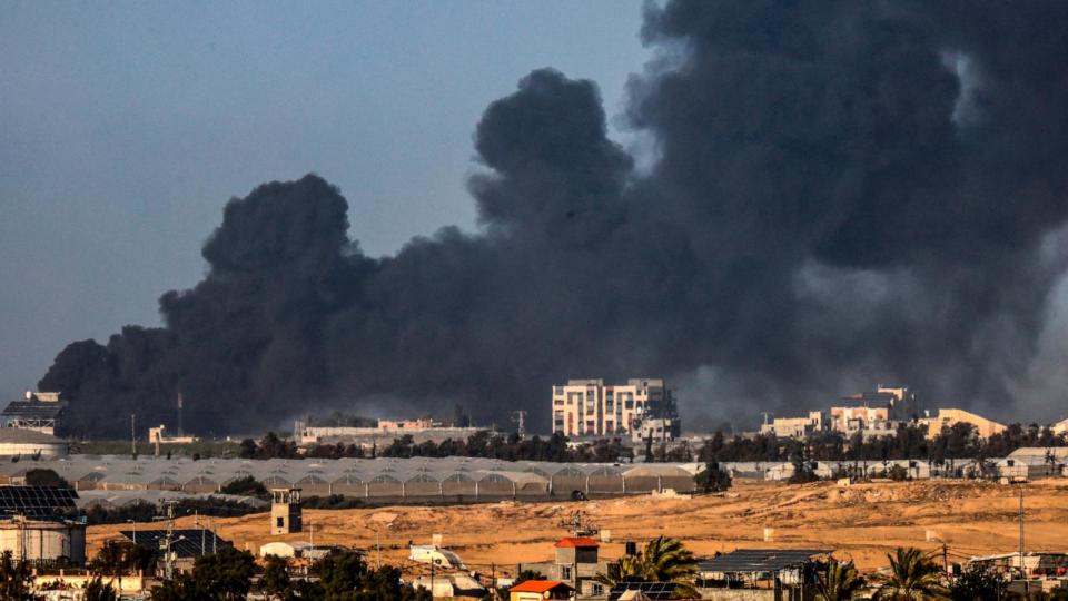 PHOTO: A picture taken from Rafah shows smoke billowing over Khan Yunis in the southern Gaza Strip during Israeli bombardment, Jan. 22, 2024, amid ongoing battles between Israel and the Palestinian militant group Hamas.  (AFP via Getty Images)