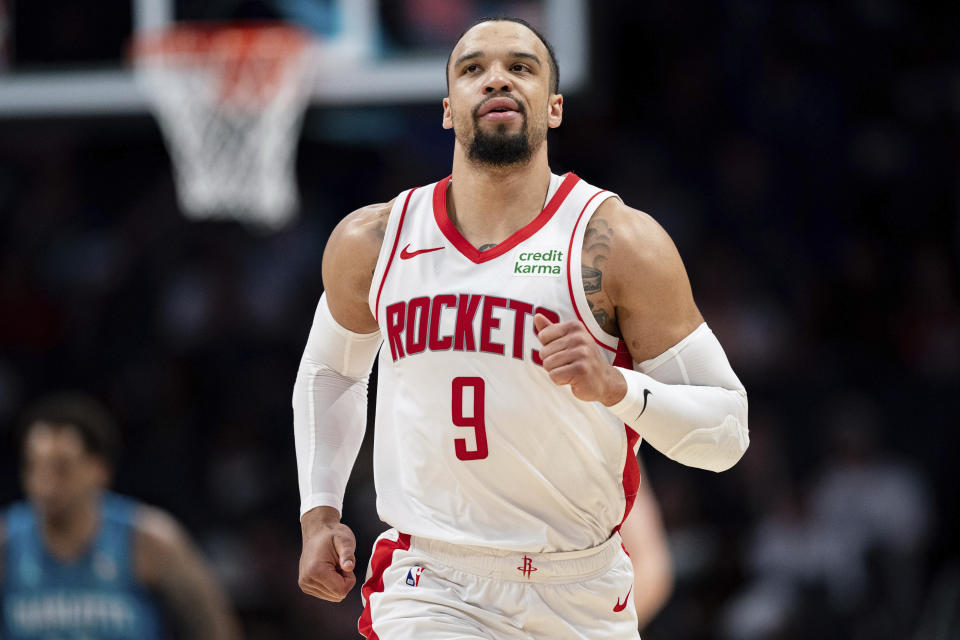Houston Rockets forward Dillon Brooks runs up the court during the first half of the team's NBA basketball game against the Charlotte Hornets on Friday, Jan. 26, 2024 in Charlotte, N.C. (AP Photo/Jacob Kupferman)