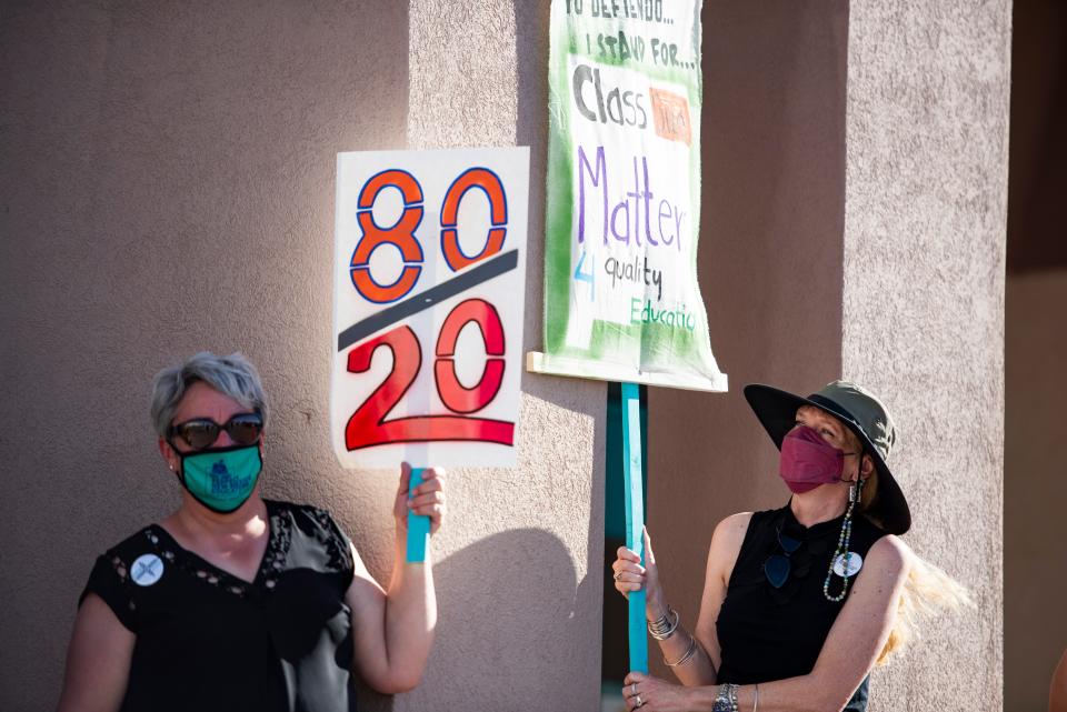 Las Cruces Public School staff and community members gather outside of the Teaching and Learning Center run by the National Education Association of Las Cruces to voice their concerns with LCPS Board of Education on Tuesday, May 17, 2022. Their concerns included classroom size, pay equity and budget practices. 