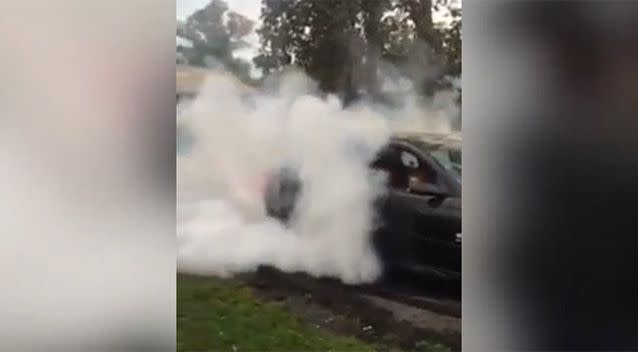 Smoke filled the air as the child revved the engine. Photo: Facebook