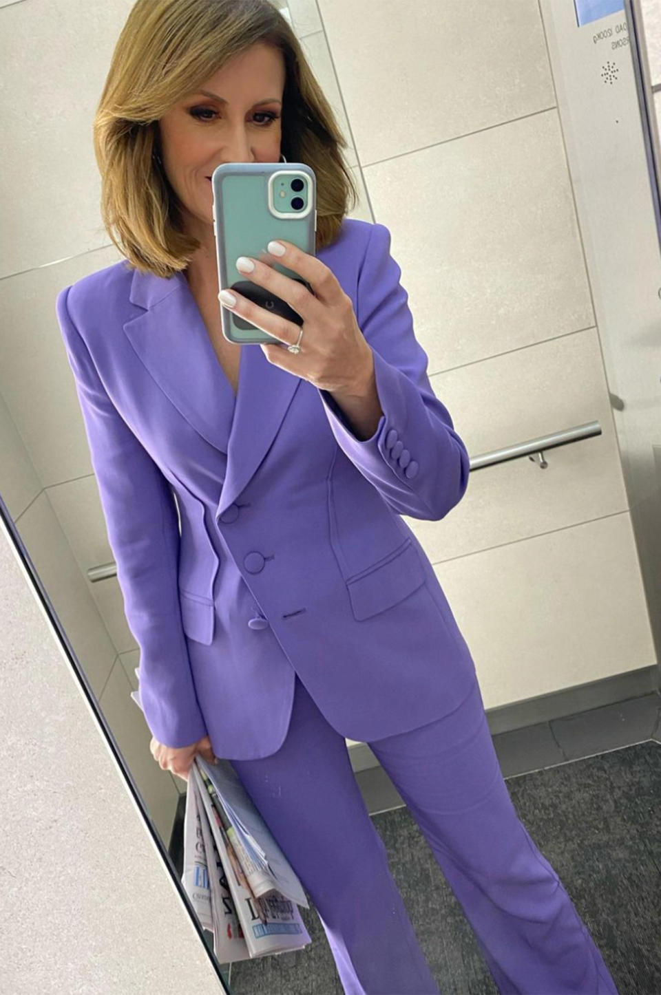 Natalie Barr in a purple Ginger and Smart suit