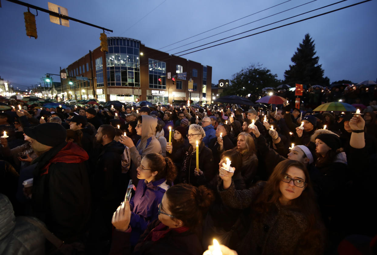 <span class="s1">A crowd gathers for a candlelight vigil in Saturday night in the Squirrel Hill neighborhood of Pittsburgh. (Photo: Matt Rourke/AP)</span>