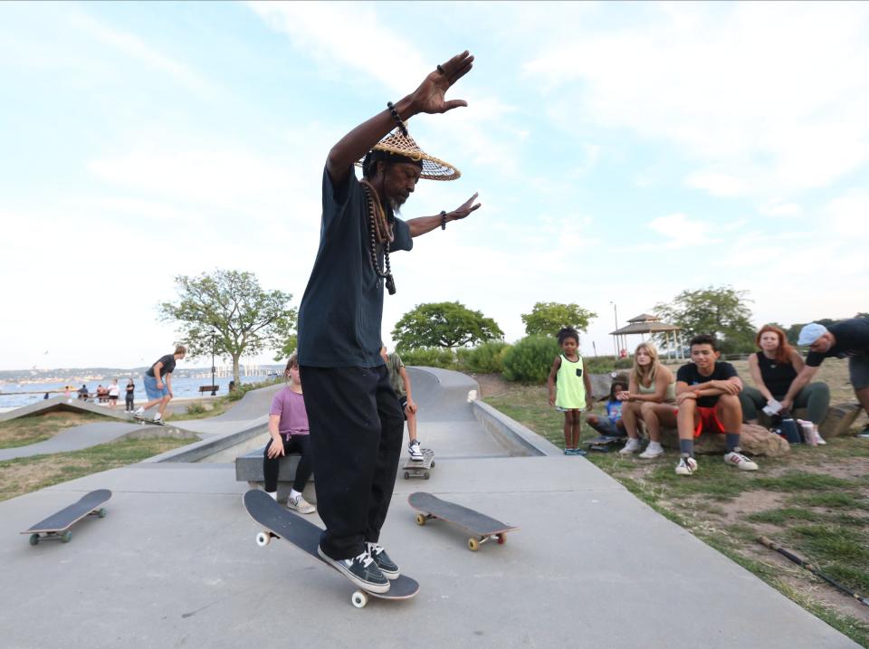 Stakeboarder Jamaal Bey show off some of his skills at the Skate Park at Memorial Park in Nyack on Friday, August 19, 2022.