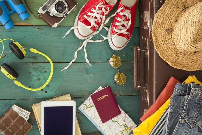 Travel accessories and a tablet.