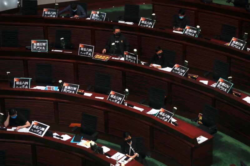 Legislators attend a council meeting to discuss the controversial national anthem bill in Hong Kong, China